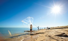 Casting out a net in Karumba