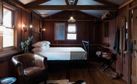 inside bedroom of slab huts acccommodation